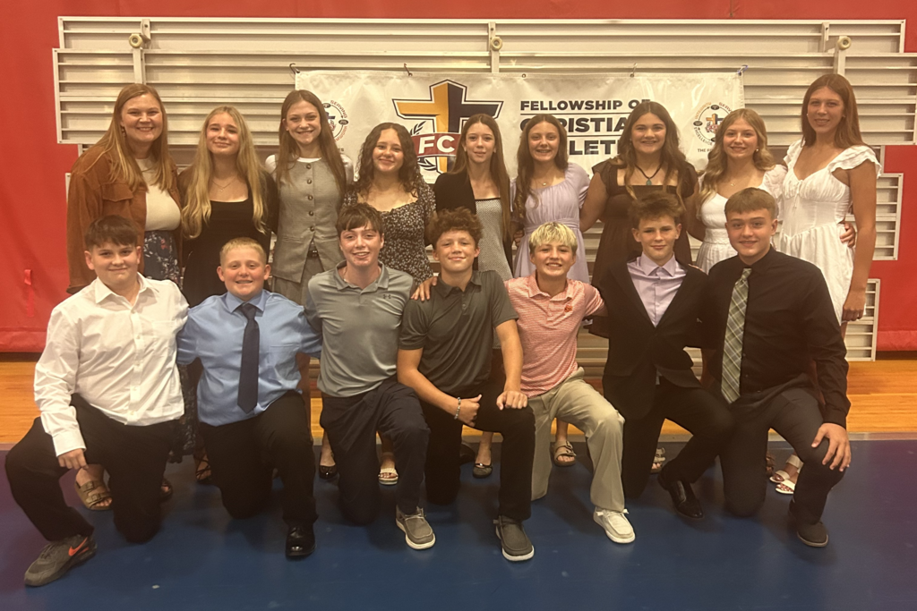 students dressed up to attend FCA banquet with sponsor