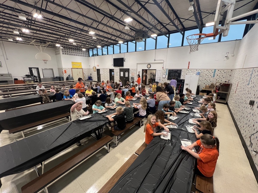 2nd grade students making oobleck in cafeteria