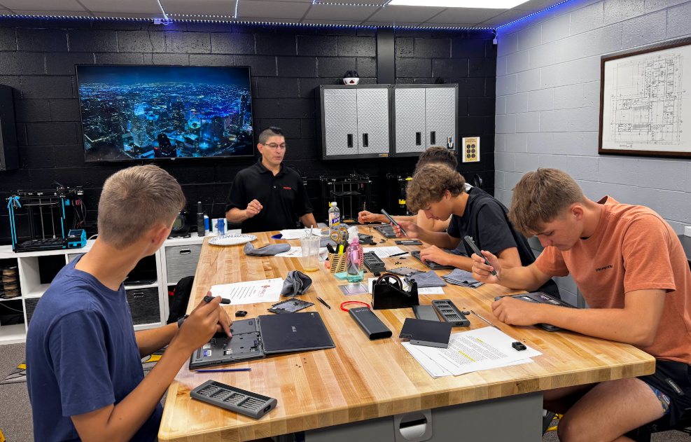 PHS Students working on Chromebook Repair