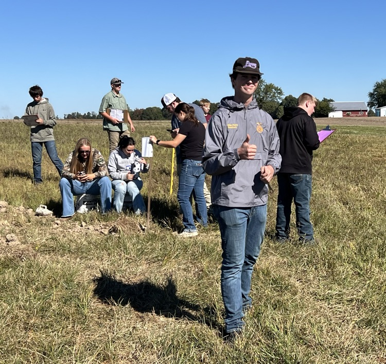 Caden Perry Section 19 Treasurer monitoring groups at the pits for the day 