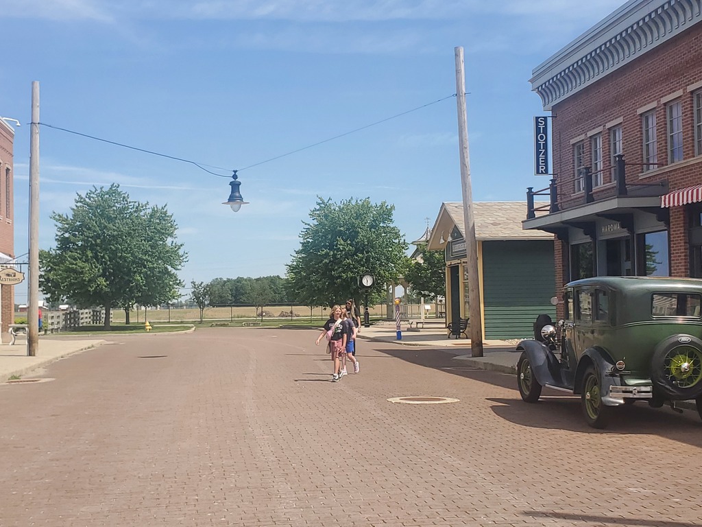 Students walked through a town designed for the early 1900s. This included a diner, clothing store, movie theater, doctor's office, train station, grocery store, and a barber shop.