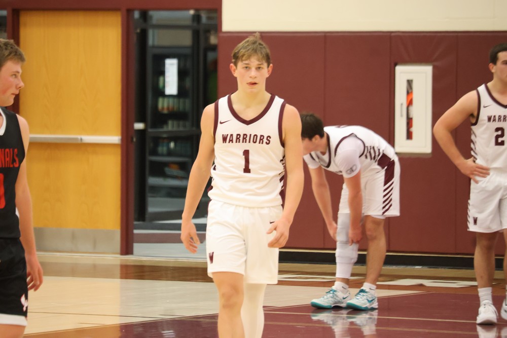 Jr. Trevor Allen excited after a Warrior point.