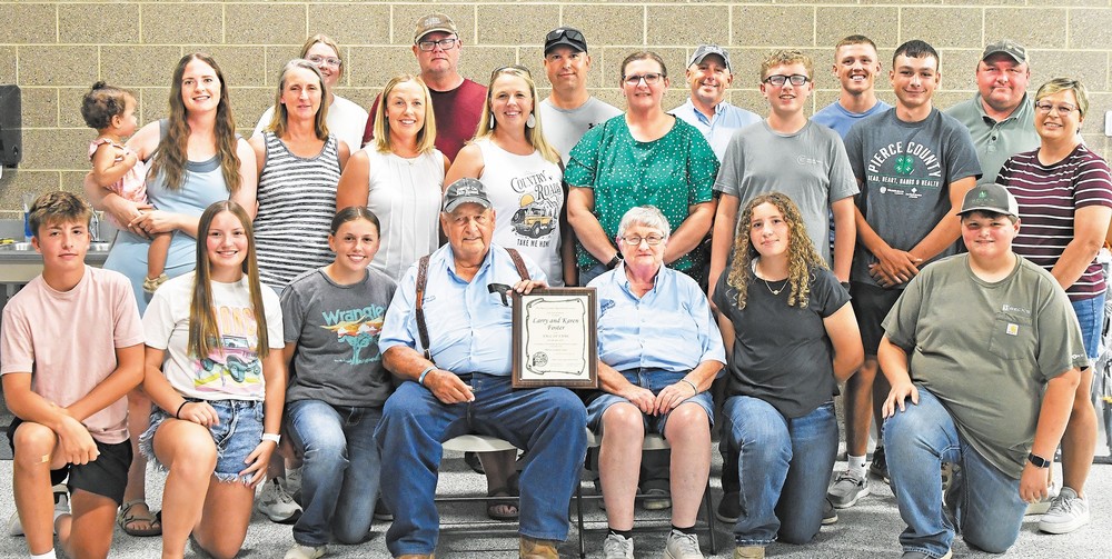Larry and Karen Foster-Hall of Fame, back row: Kayci Daudt, Robert Daudt, Ryan Lichtenberg, Nick Schroth, Wyatt Schroth, Alan Foster; middle row: Hayly Daudt holding Luna Daudt, Ann Daudt, Becky Lichtenberg, Bonnie Schroth, Brenda Wieckhorst, Braxton Wieckhorst, Blake Foster, Angela Foster; front row: Logan Lichtenberg, Kylee Lichtenberg, Emilee Schroth, Larry Foster, Karen Foster, Braellen Wieckhorst, Bryson Wieckhorst