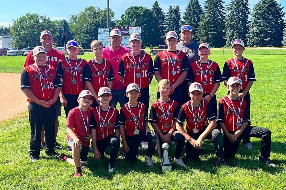 The Plainview 12-and-Under baseball team included, front row (l to r): Dex Frahm (bat boy), Colesyn Forbes, Jaxson Miller, Zane Kromarek, Kamdon Riley, Mason Richter Middle row: Hudson Steinkraus, Colt Frahm, Tristan Slater, Toby Koehler, Tate Frahm, Emmet Hoffman and Cooper Kumm; and back row (coaches): Wade Frahm, Monte Miller, Ward Frahm
