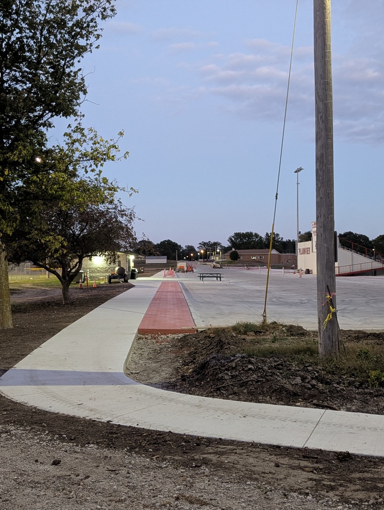 Sidewalk completed near ballfields, work continues