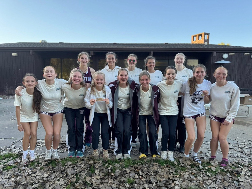 The girls cross country team celebrates their first place victory again. Bethany Arens, Emily guenther Brooklyn guenther, Ella Reifenrath, Morgan Stevens, Keisha strunk, Hudsyn stout, Sophia Wortmann, Avery Arens, Claire marsh Cecelia Wortmann, Lauren loecker, Madelyn Bushkamp, Pamela Dennis