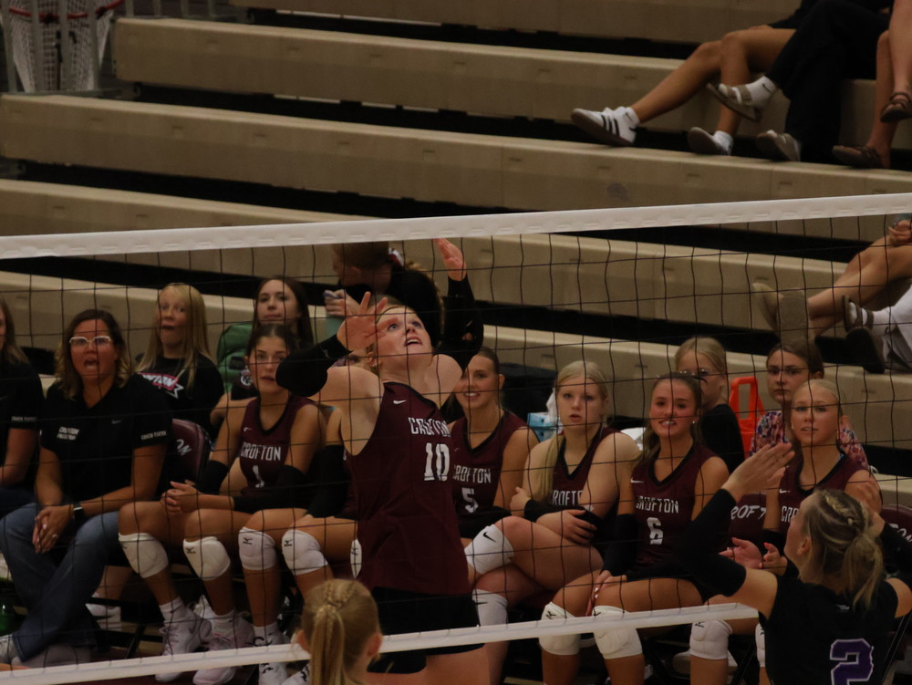 Addyson Ostermeyer (10) goes up for a kill.