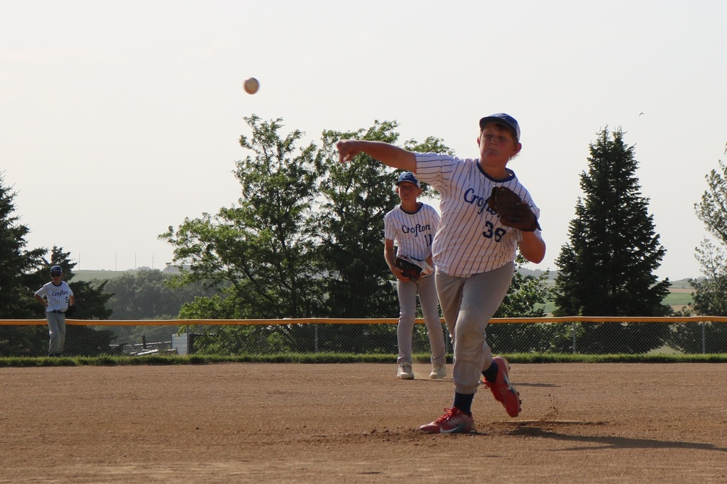 Isaac Guenther is pitching while Braxton Hames is playing shortstop