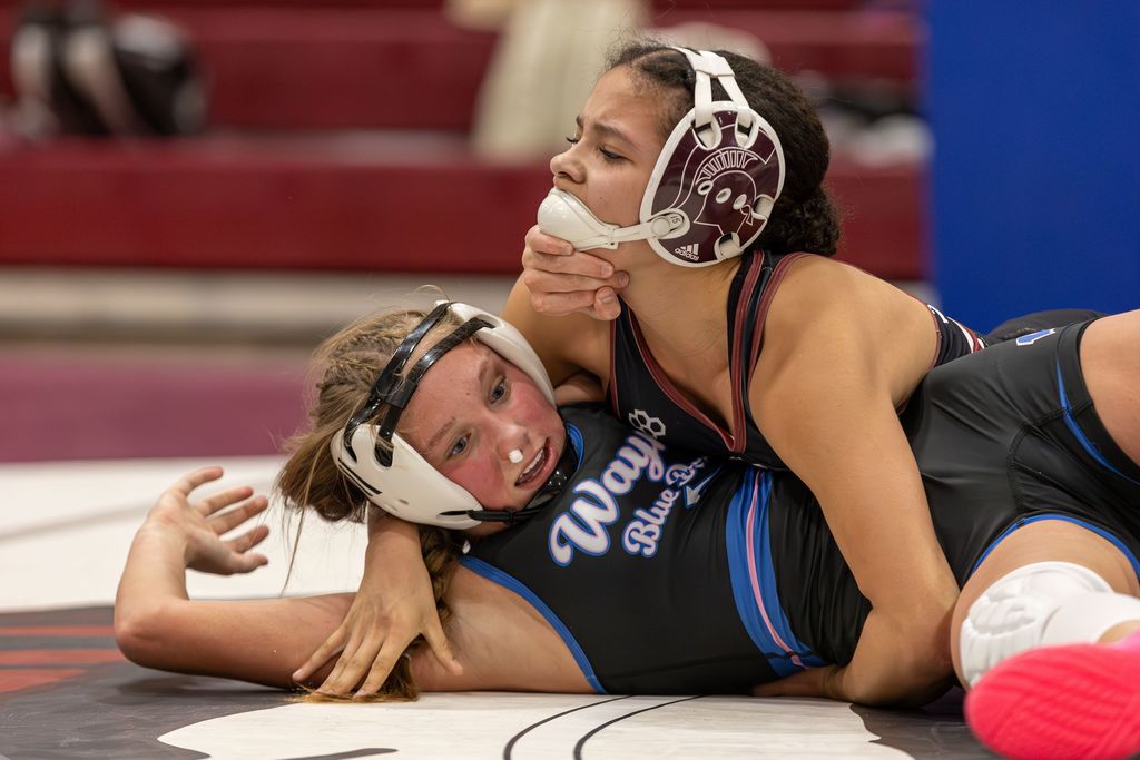 Arianna Juarez who won by fall over Hadley Woehler of Wayne.