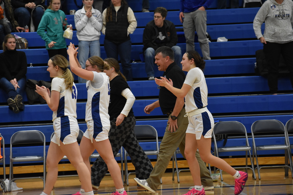 Cougar girls clapping after winning a sub-district game