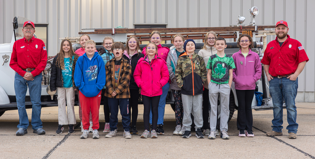 row (l to r): Firefighter Rick Mosel, Merrit Tarr, Harper Stec, Josie Wells, Kaydence Doerr, Madi Bennett, Stormie Rewinkel, Harper Schmidt and Firefighter Ty Hampton; and front row (l to r): Aven Torrey, Evan Nicehelser, Leyton Wynia, Paige Hodson, Jameson Yilk and Rylie Bowman.