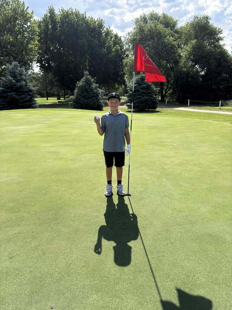 Coffman scores hole in one