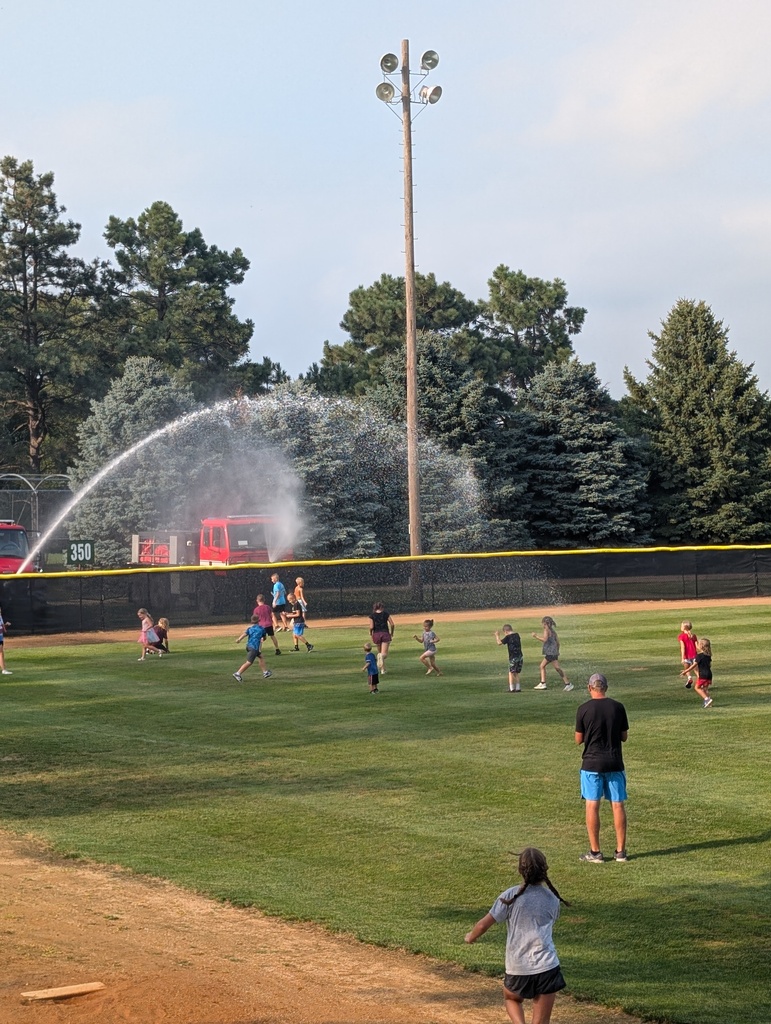 The Crofton Fire Department cools off finishers!