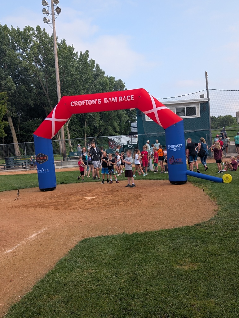 Race finishers enjoy a frozen treat at the finish line