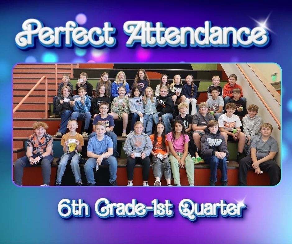 A group of students sitting on  a large staircase who are being recognized for quarter 1 perfect attendance.