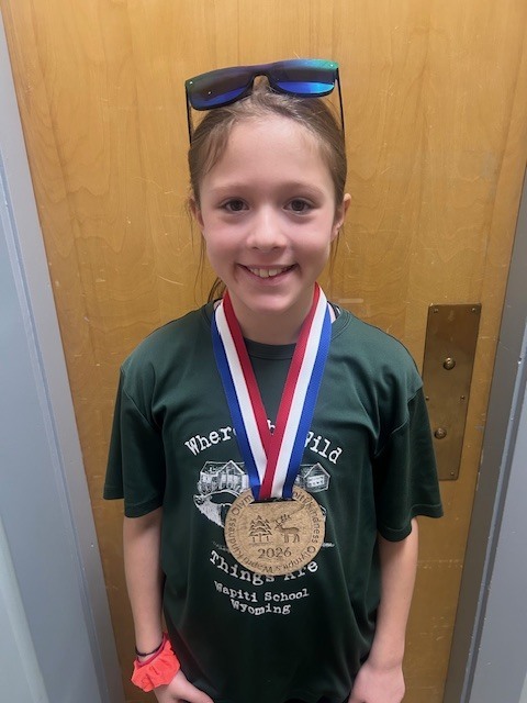 Harper was our first winner of a gold medal for the Kindness Olympics. She showed GRIT during the 100 dominoes challenge! She didn't give up!