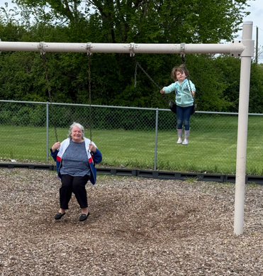 grnadma and kid swinging 