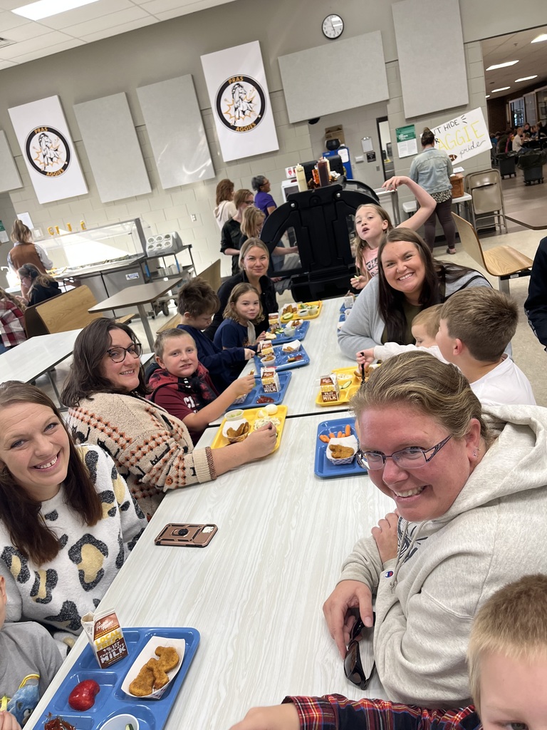 Parents eating lunch with students