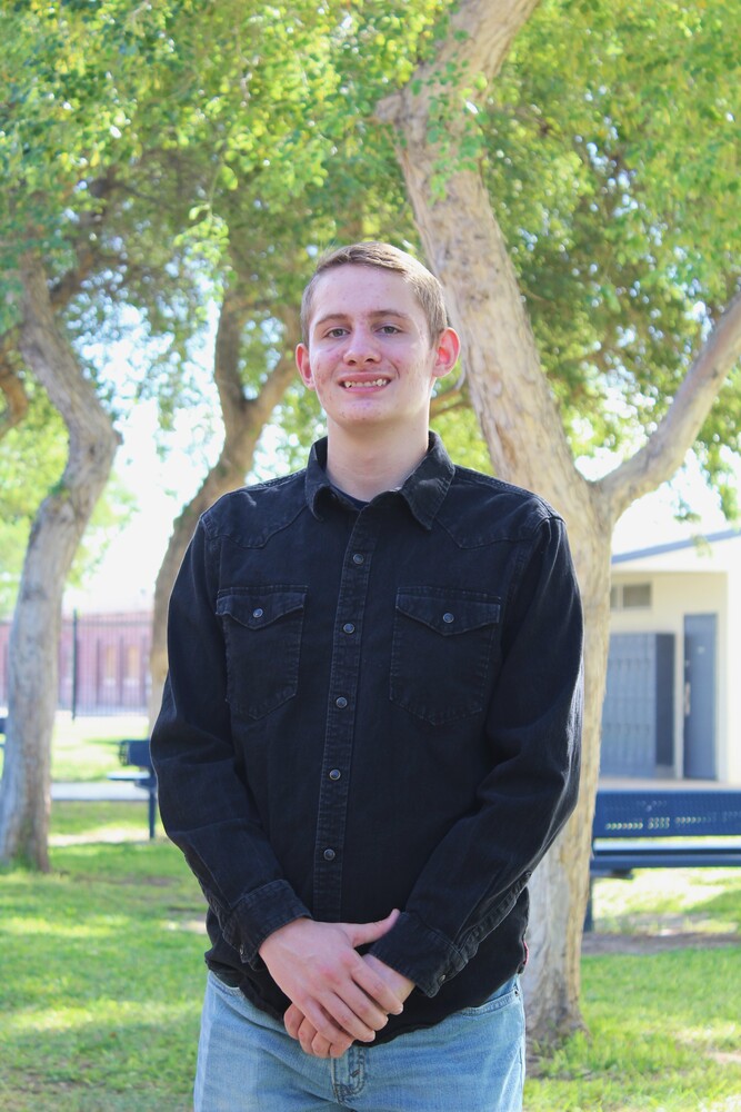 Jordan Bailey smiling on a warm afternoon in the PHS courtyard