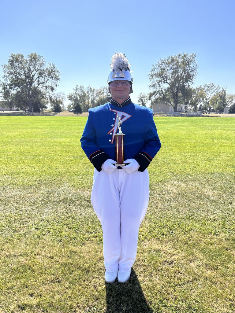 Drum Major Isaac Soulek with the 2nd place trophy.