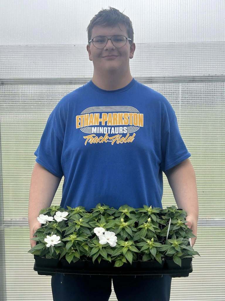 Boy Holding White FLowers