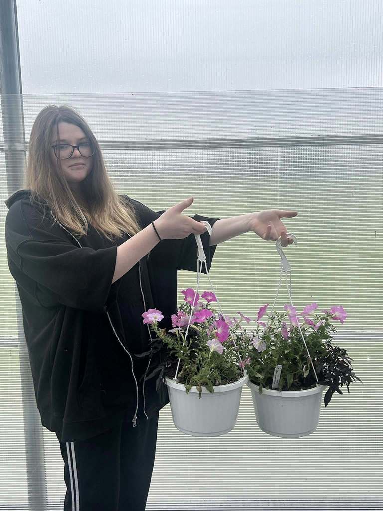 Girl Holding Flower Pots