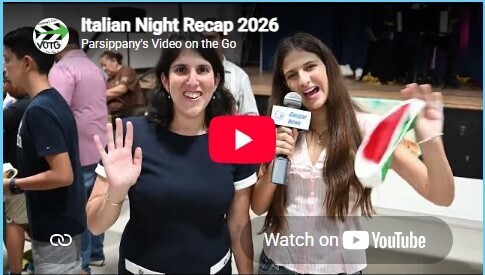 Two people waving from Italian Night Recap 2026