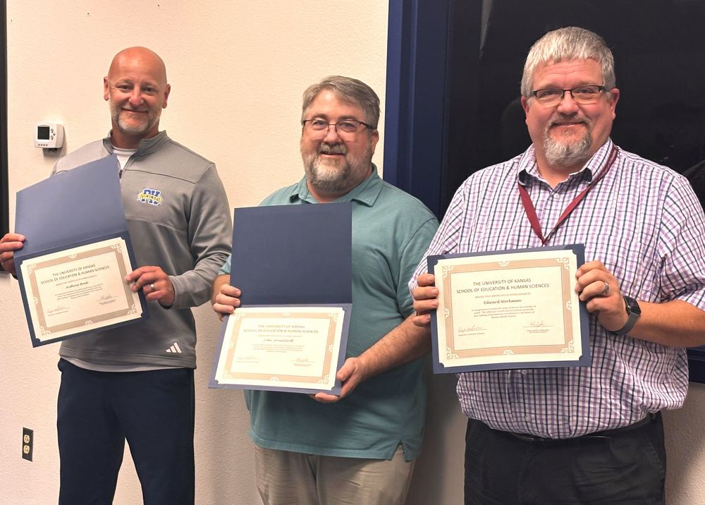 Picture of Anthony Houk, John Womeldorff and Ed Workman with their certificates.
