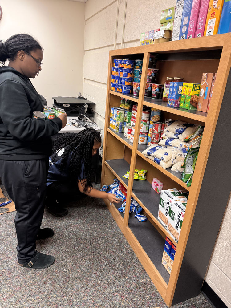 CAMP students stock the new Viking Food Bank