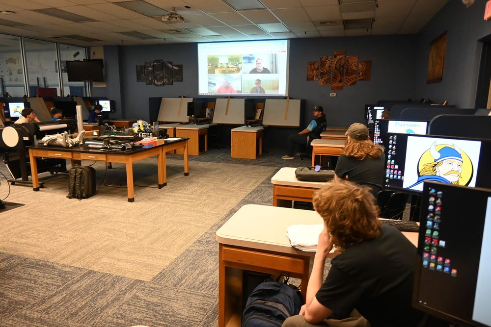 Students join in a Teams meeting with Magnum engineers.