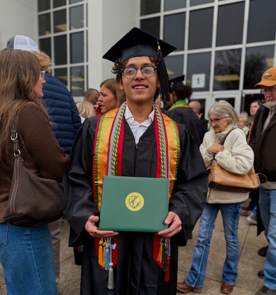 Ramirez  in his college regalia after graduation.