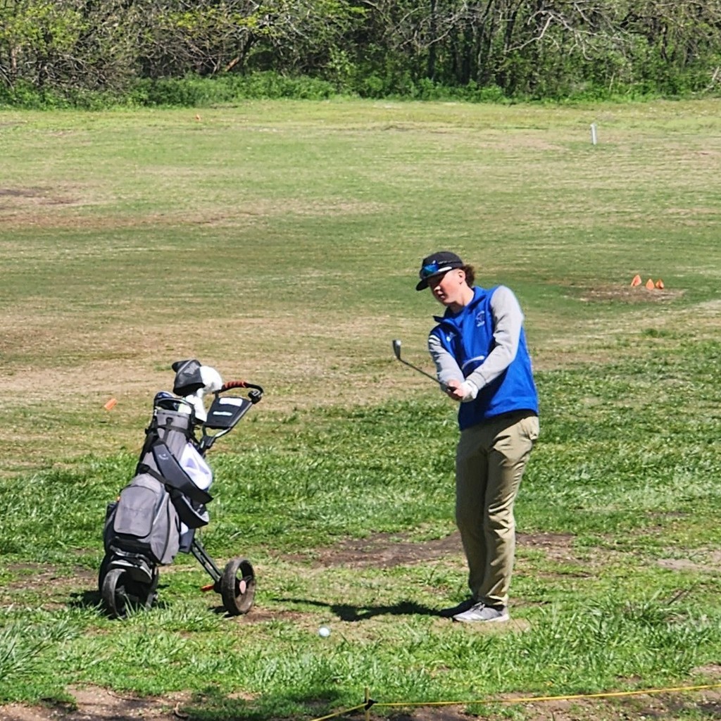 Joe Keal lining up his approach shot on 13.