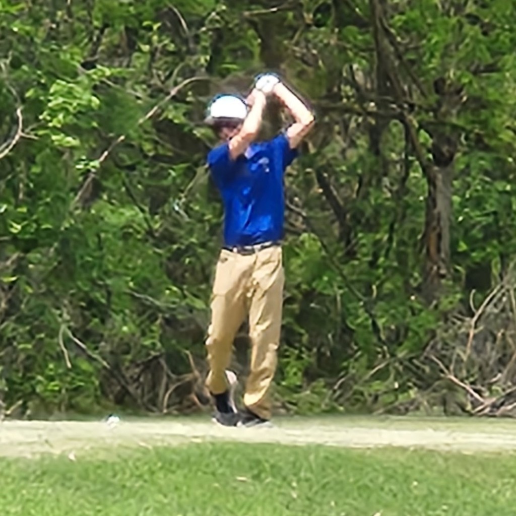 Brok McDaniel takes a practice swing on number 6. It is a beautiful day at the Katy!