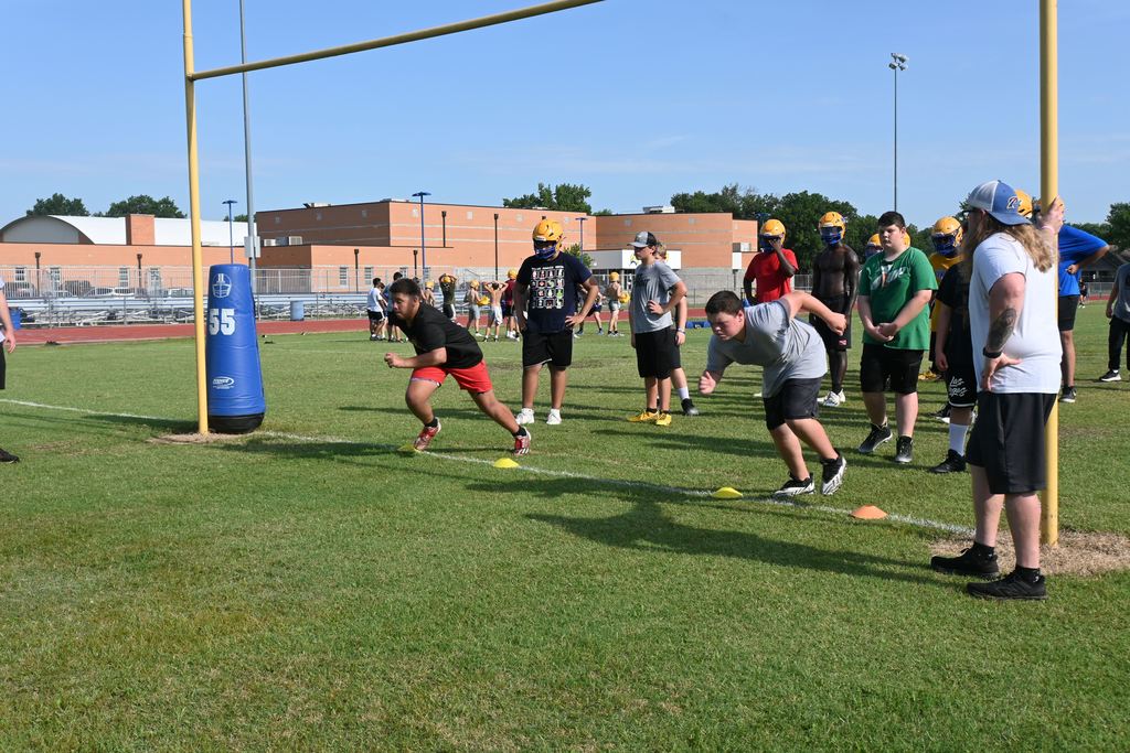 Students run drills