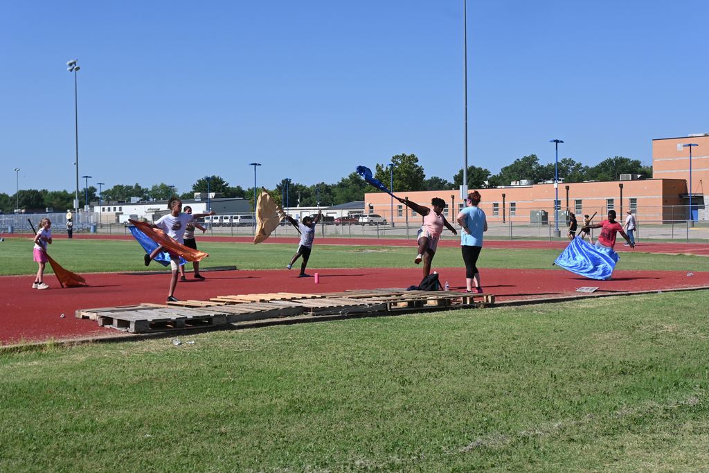 Color Guard students practice their routines for performances.