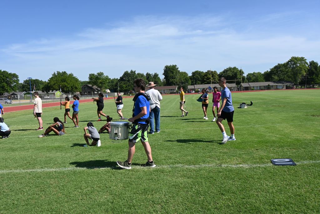 Band  and Viking Dance students practice marching formations.