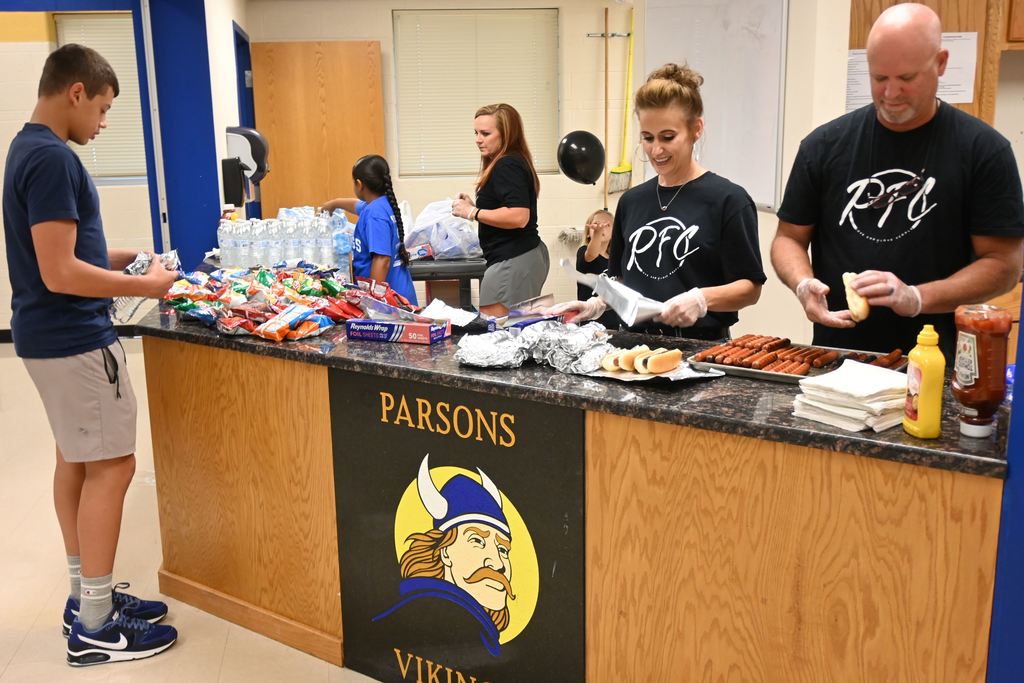 Students' and their families received a free dinner of hot dogs and chips!