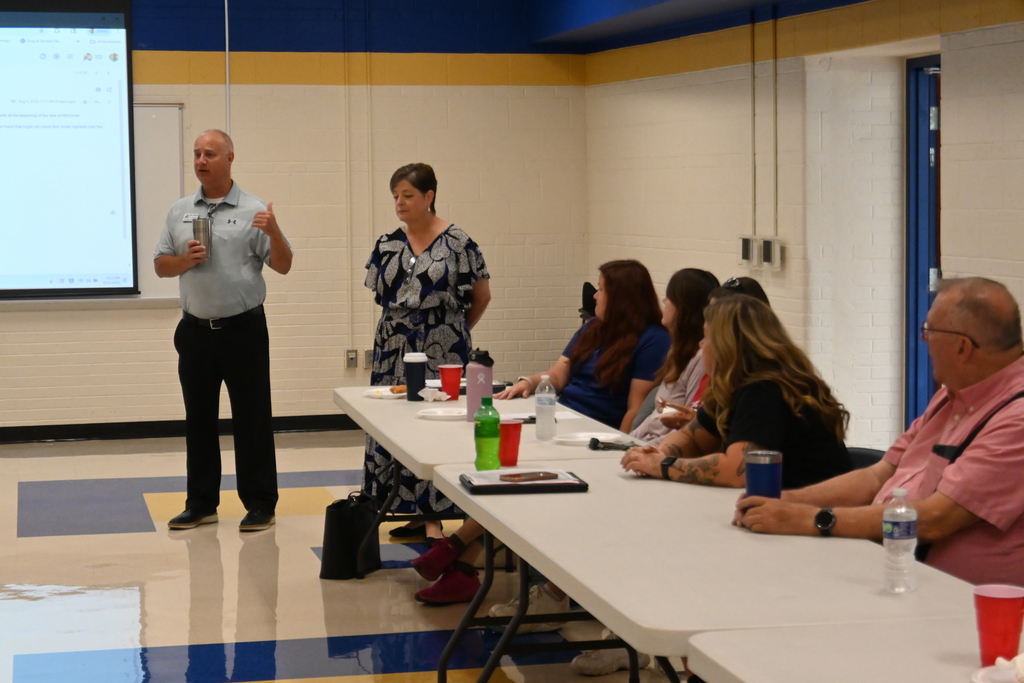 Assistant superintendent Jeff Pegues speaks to the bsu drivers and monitors.
