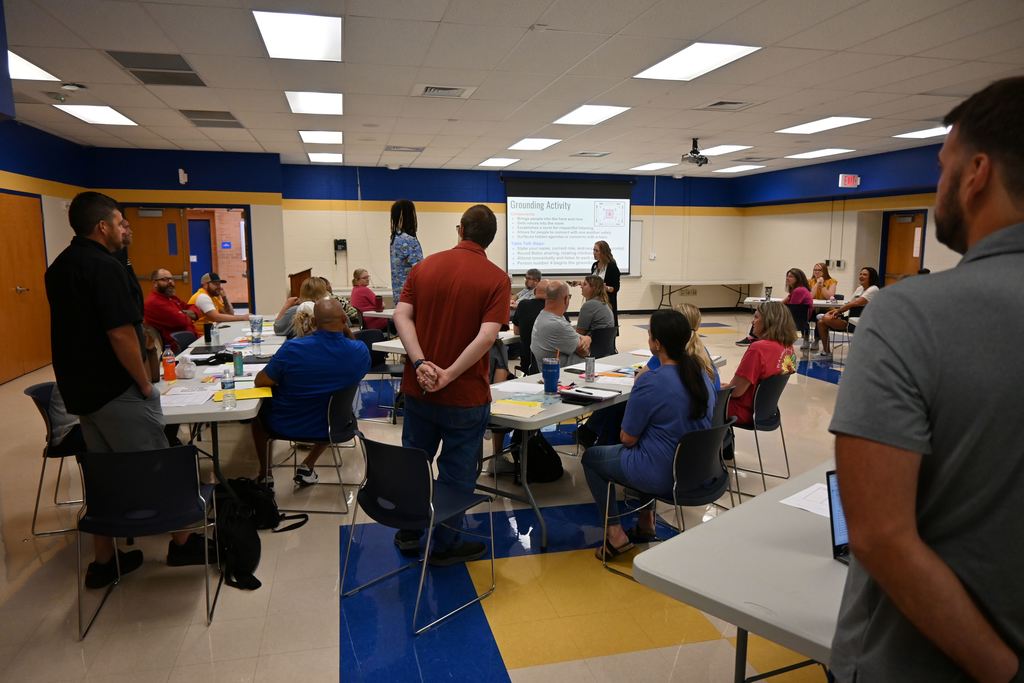 Jeanna Scheve  conducts an exercise with PHS teachers.