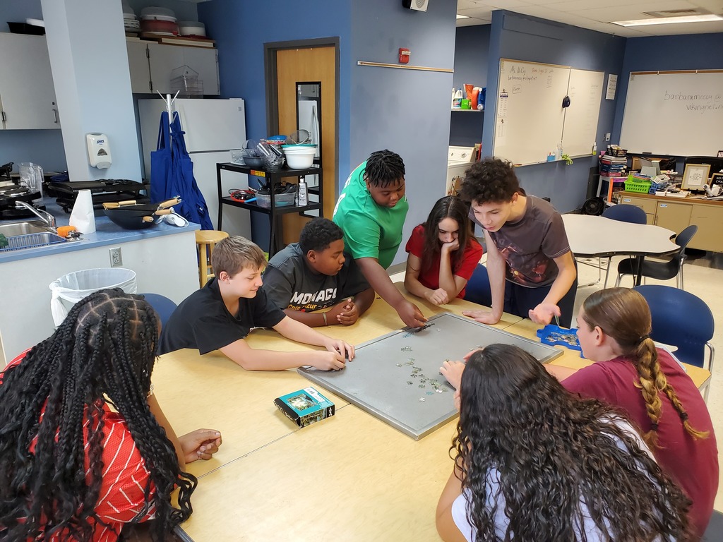 FACS students working on puzzle 