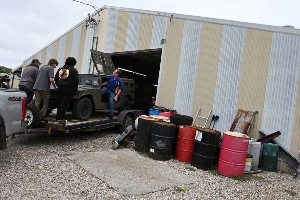Three PHS students came to assist Mr. Rea with unloading the Humvee.