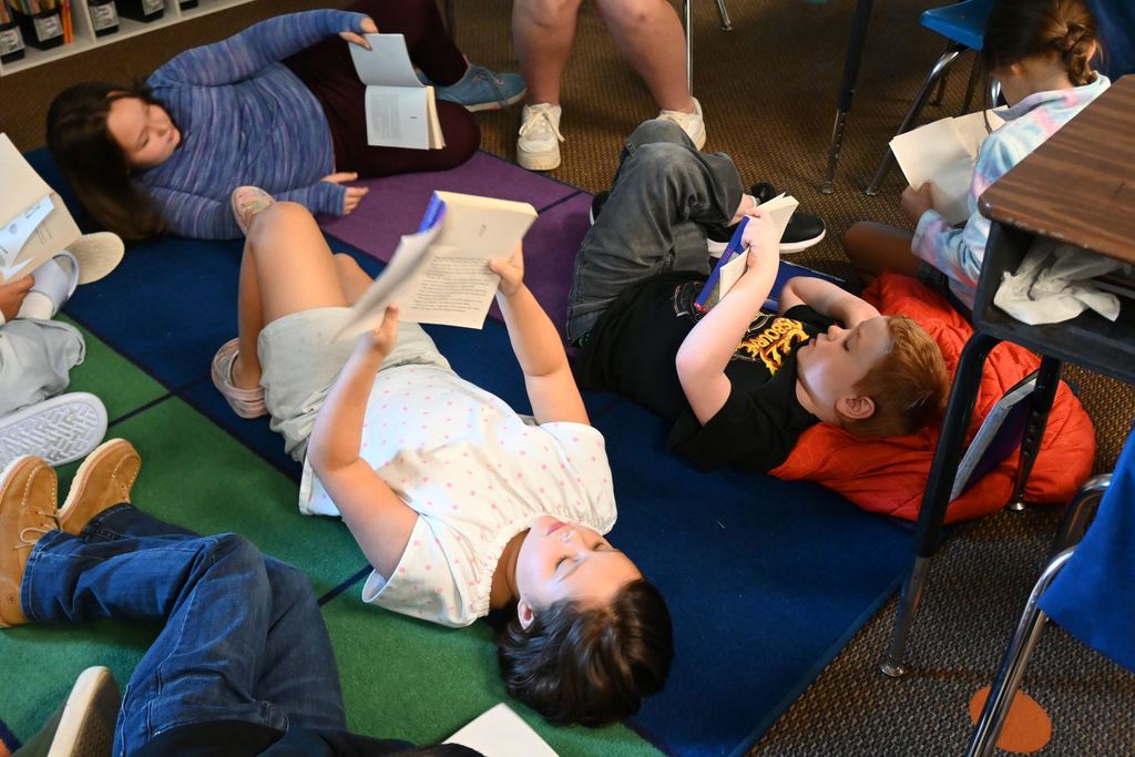 Students follow along as they begin the story.
