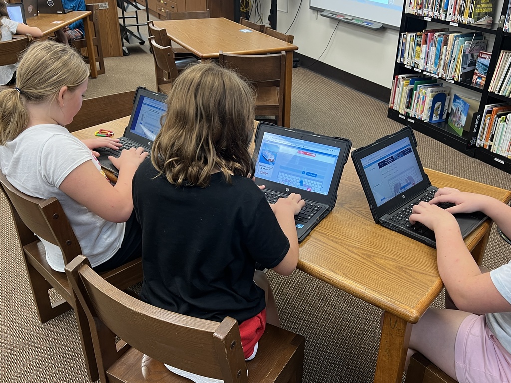 Students practice typing.