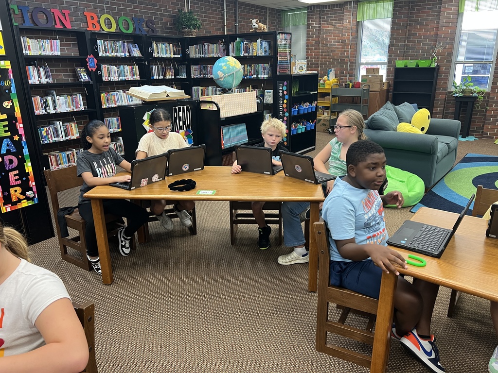 Students practice typing.