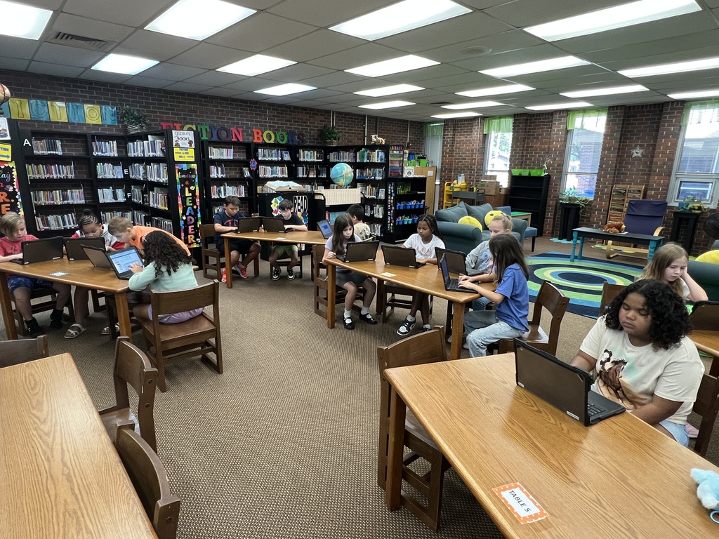 Students practice typing.