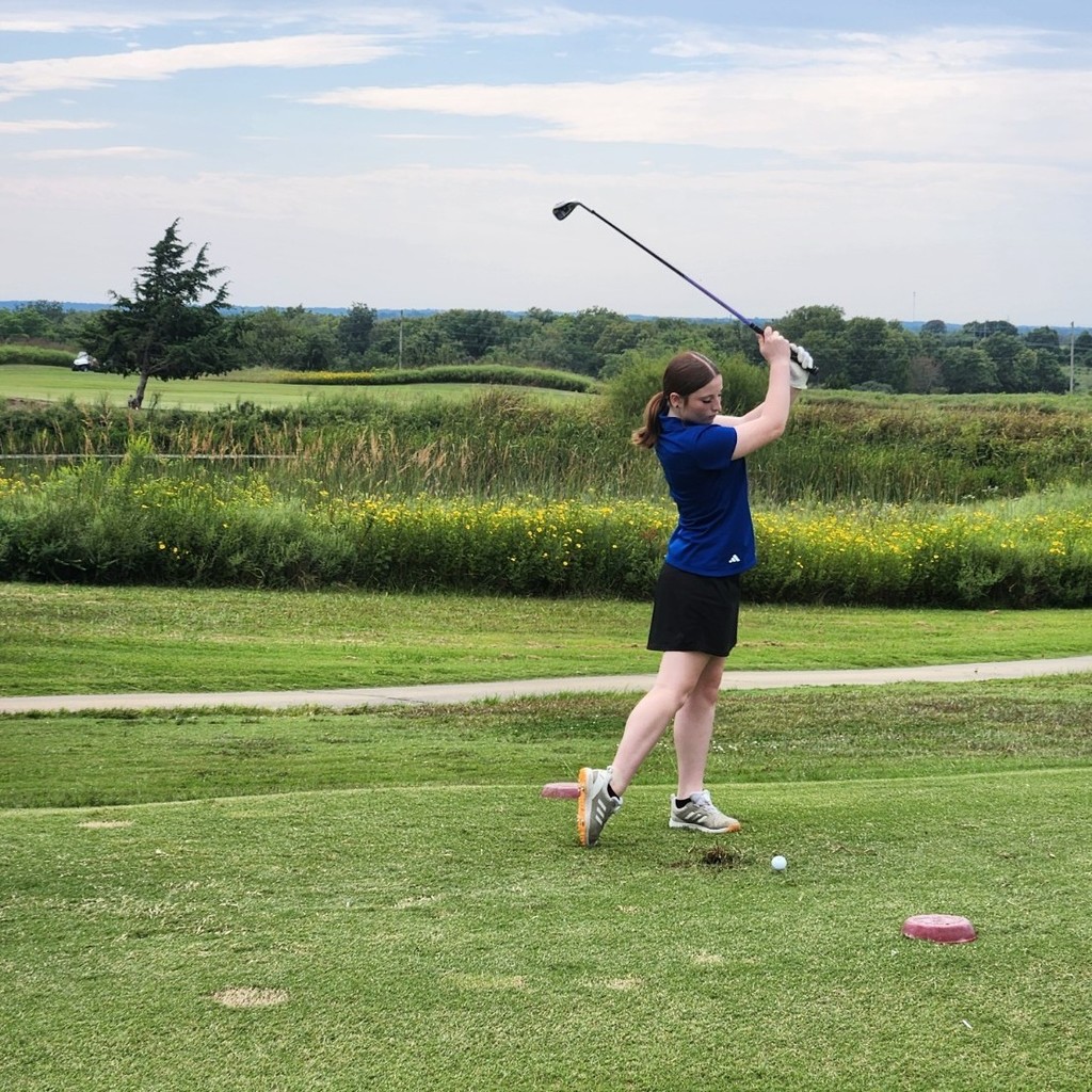Kayleigh taking a practice swing  on number 4.