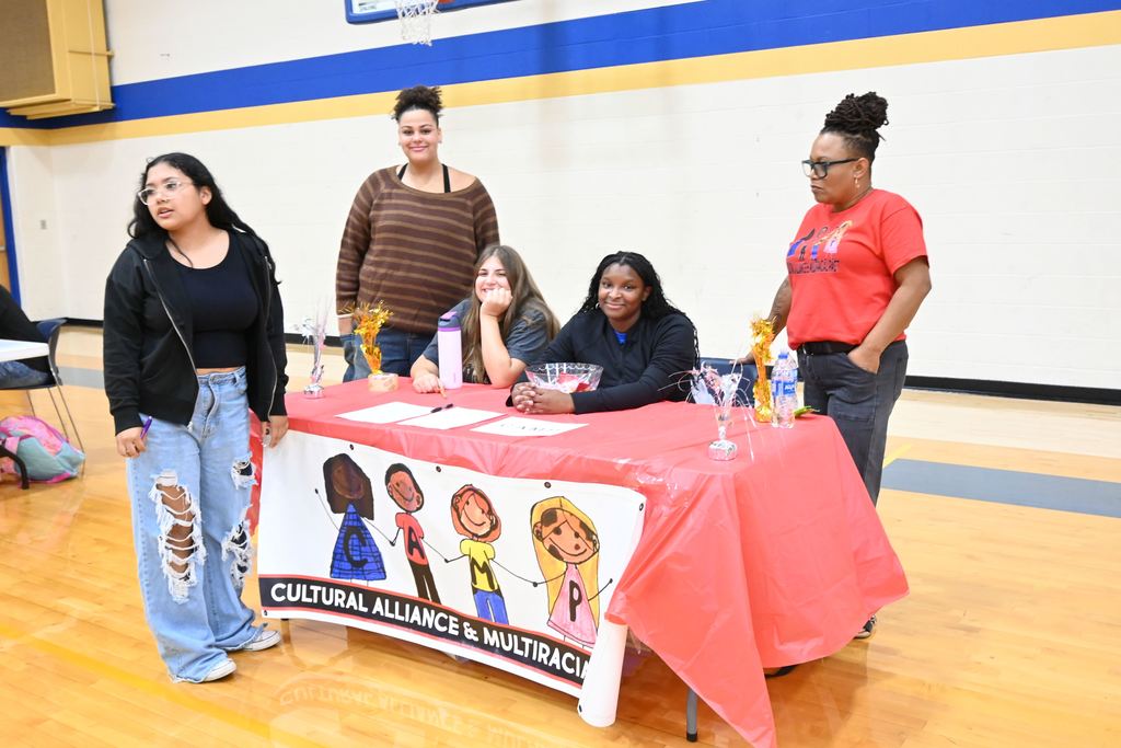 A student signs up for the CAMP Club