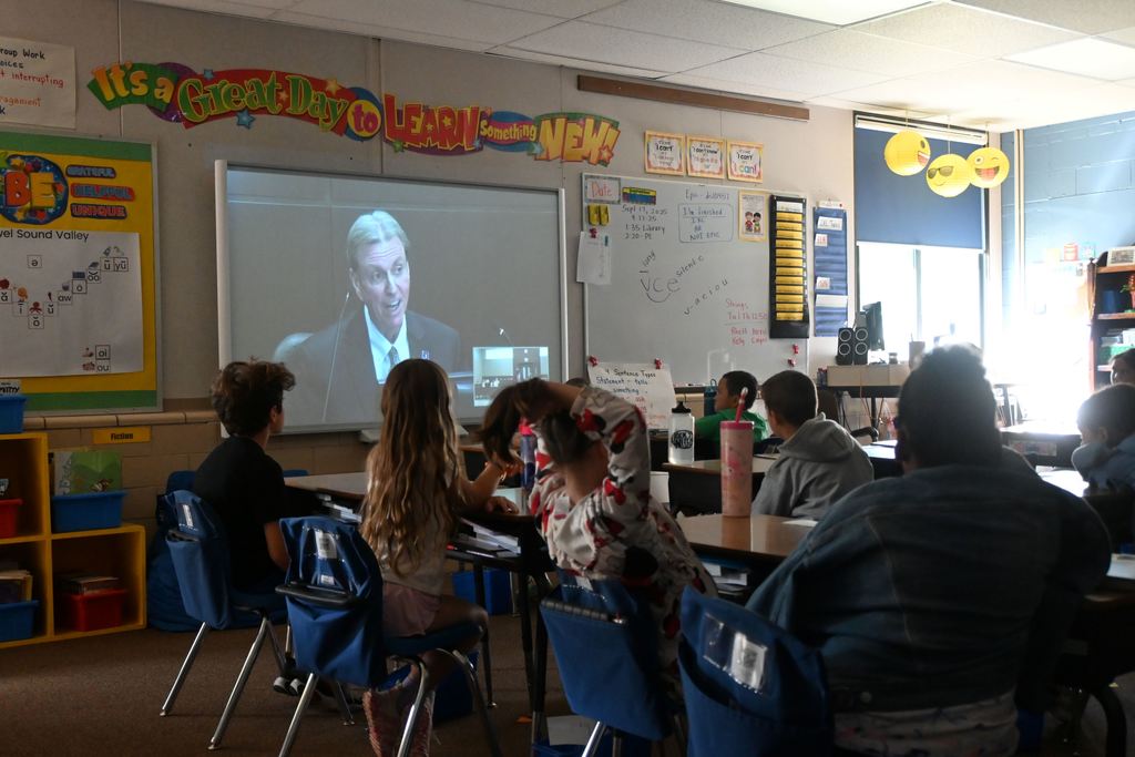 Dr. Randy  Watson portays a teacher in a mock trial.