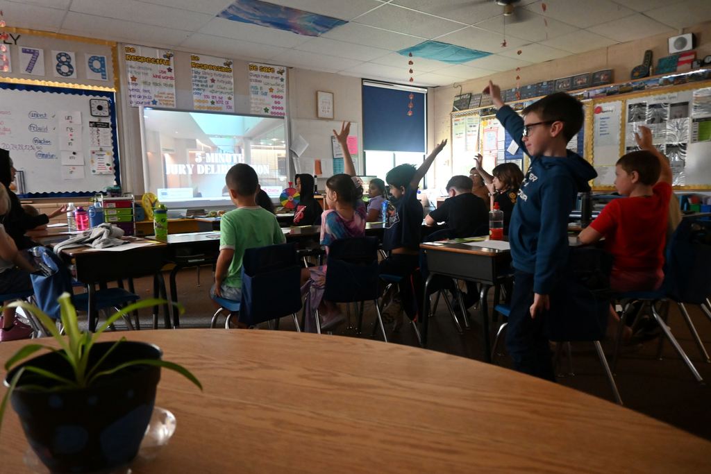 Students wrap up their final discussion as jurors to cast their vote with other students across the  nation.