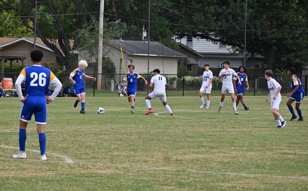 PHS players kick the ball to one another.